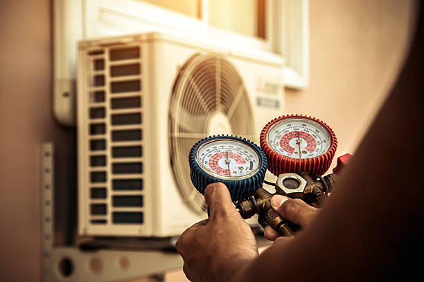 Professional Heat Pump Repair technician working in Bellflower, CA